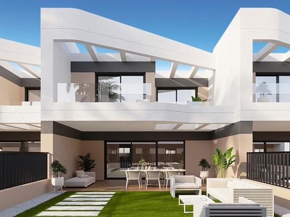 Townhouses overlooking Alicante Golf with modern designs and nearby beach access.
